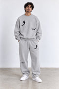 Classic Set in Grey, front view with the Arabic letter on the chest and leg