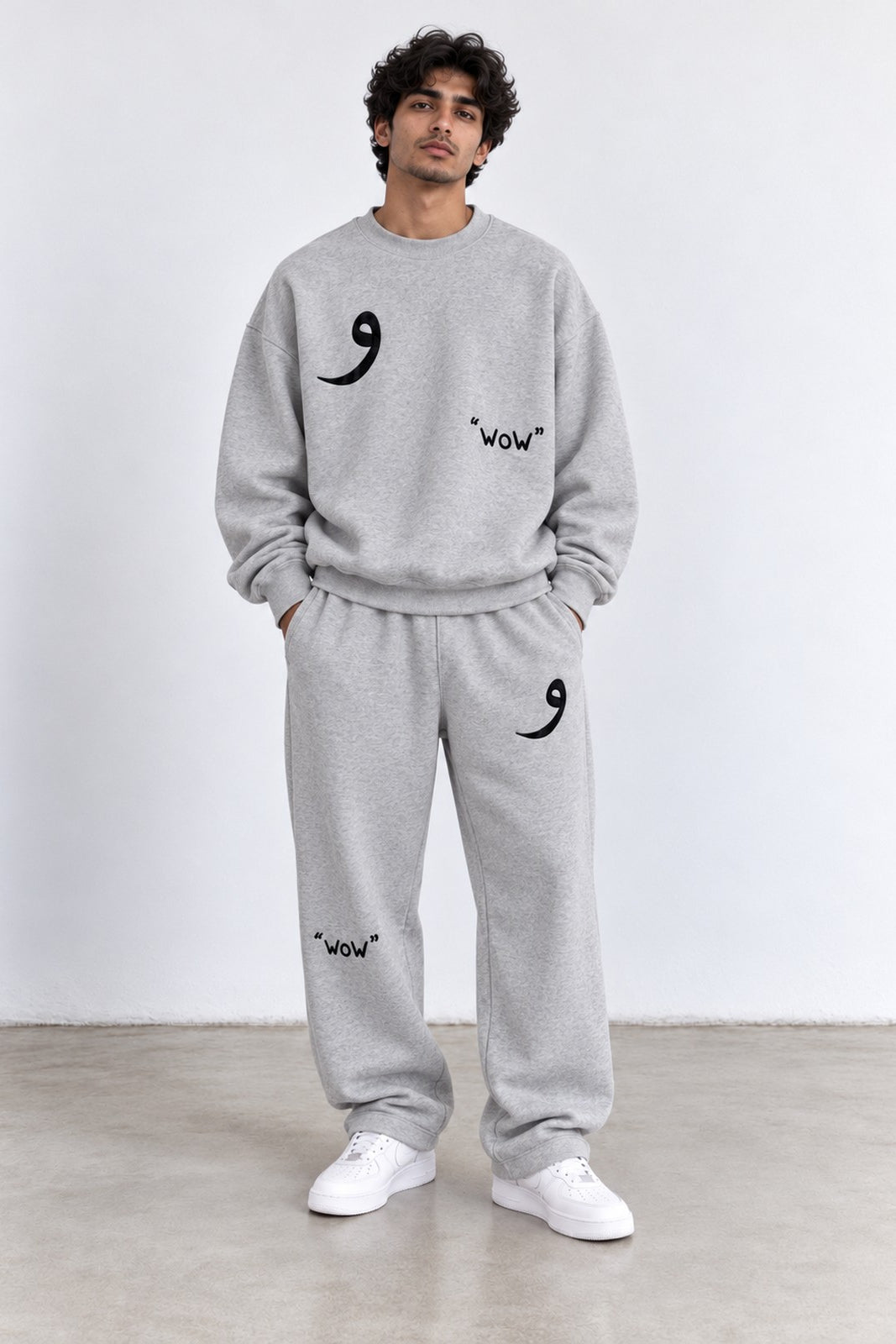 Classic Set in Grey, front view with the Arabic letter on the chest and leg
