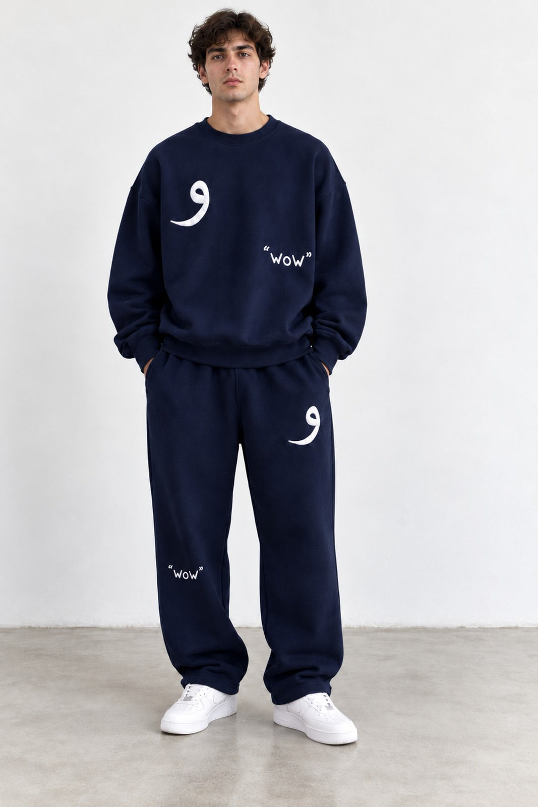 Classic Set in Navy, front view with the Arabic letter on the chest and leg
