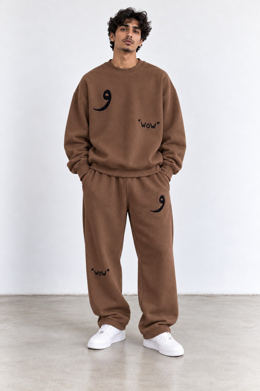 Classic Set in Brown, front view with the Arabic letter on the chest and leg