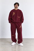 Classic Set in Maroon, front view with the Arabic letter on the chest and leg
