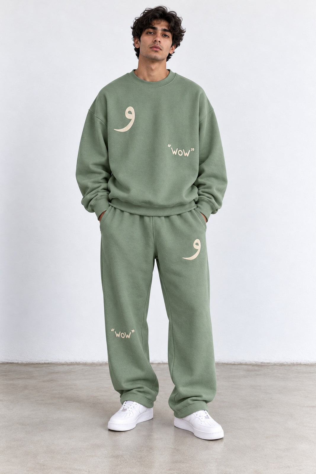 Classic Set in Green, front view with the Arabic letter on the chest and leg