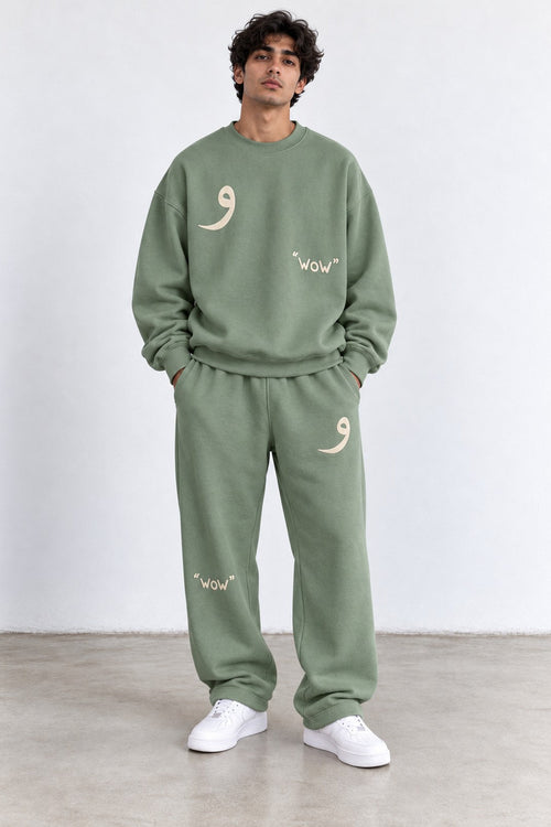 Classic Set in Green, front view with the Arabic letter on the chest and leg