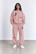 Classic Set in Pink, front view with the Arabic letter on the chest and leg