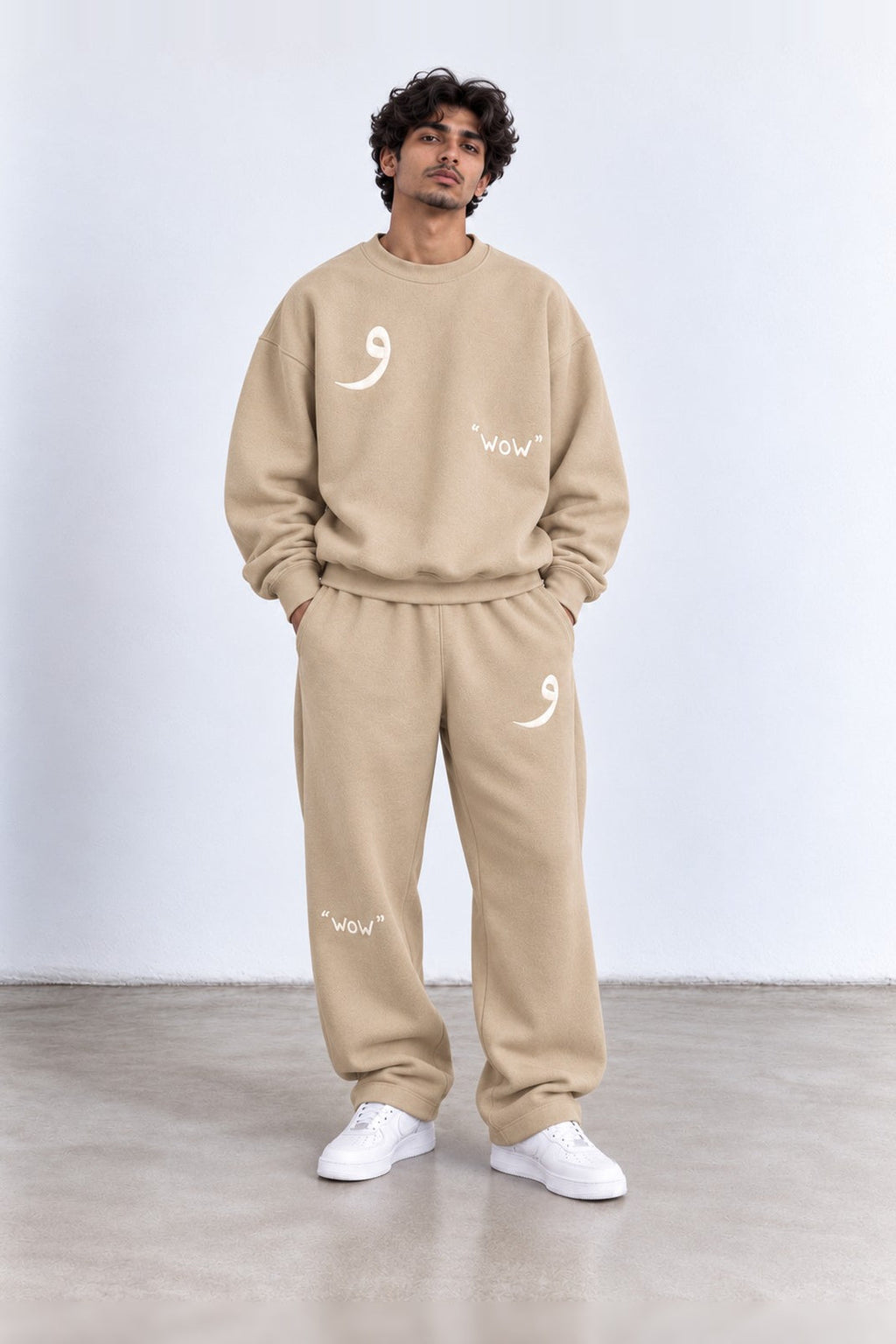 Classic Set in Beige, front view with the Arabic letter on the chest and leg