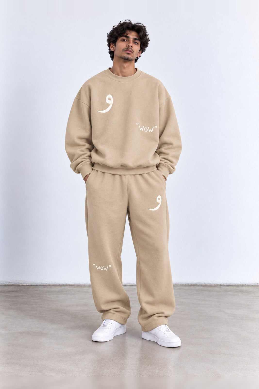 Classic Set in Beige, front view with the Arabic letter on the chest and leg
