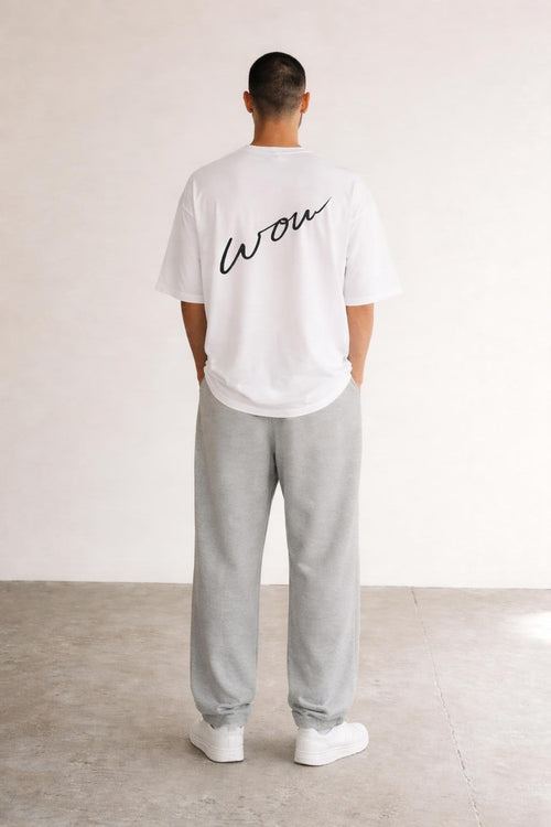 Back pose of the model wearing Classic Handwritten Tee