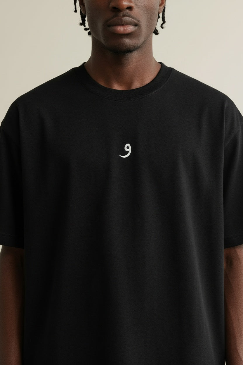 Close-up of the model wearing Mini Logo Tee Black