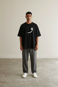 Full body view of the model wearing Classic Handwritten Tee Black
